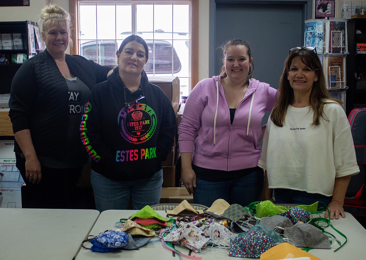Look for the helpers Ephrata fabric shop coowner, quilters working to